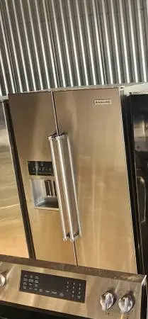 Kitchenaid stainless counter depth side by side refrigerator with deli