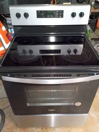 Newer Whirlpool stainless steel black stove oven range glass cooktop