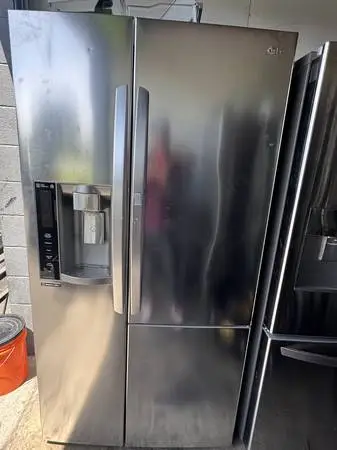 Lg counter depth side by side smart refrigerator small dent