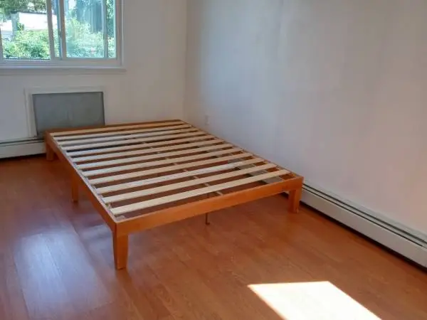 Queen Size Blonde Wood Bedframe (Slats included)!!!