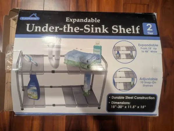 Expandable under the sink 2 tier shelf new condition in original box