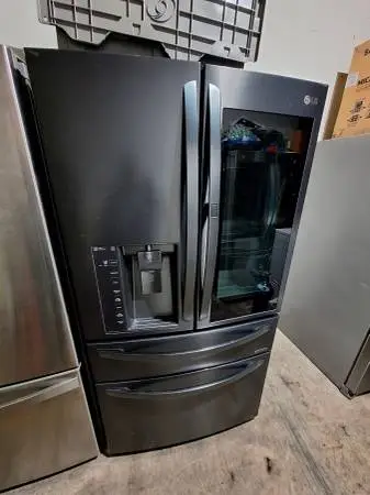 Lg Instaview refrigerator black stainless
