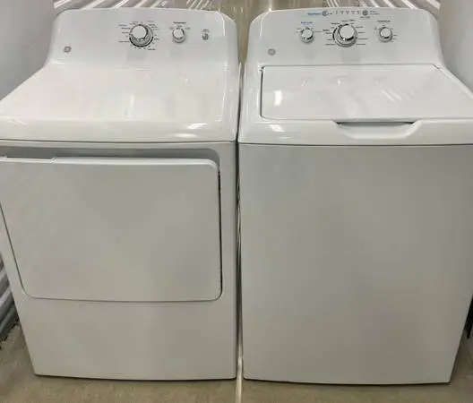 *2021 G.E. 3.8 Cubic ft. Capacity Washer and Electric Dryer*