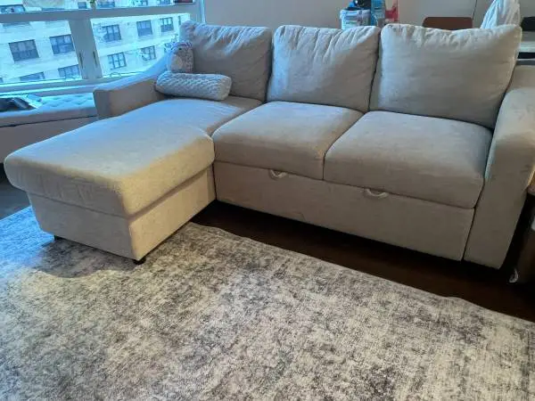 Sofa with Reversible Chaise and Storage.