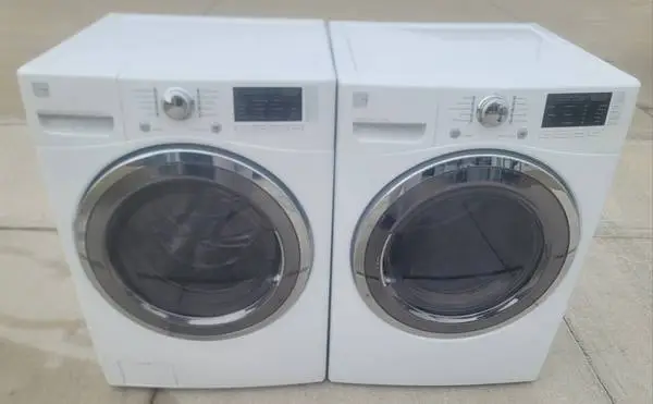 L,G HIGH EFFICIENCY STEAM FRONT LOAD WASHER AND DRYER ON PEDESTALS