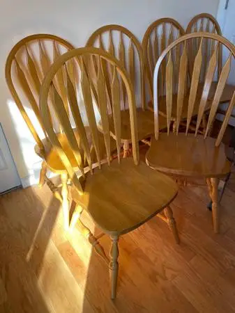 6 wooden chairs $15 each, good condition.