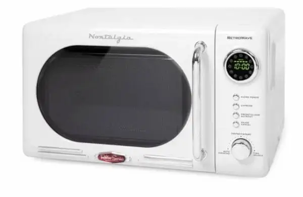 WHITE COUNTERTOP MICROWAVE — LESS THAN 1 YEAR OLD — $50
