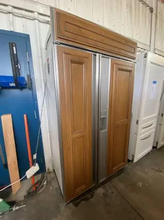 Brown Panel Sub-Zero Side by Side Refrigerator Model #690/F Used