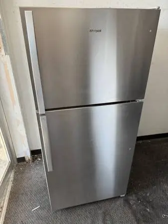 1 yr old Kenmore white refrigerator and top freezer