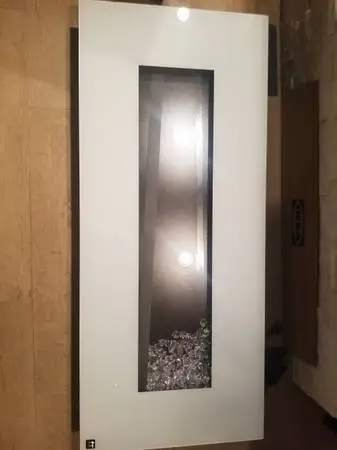Fireplace Electric couch IKEA chairs Wall Art Light Window shades