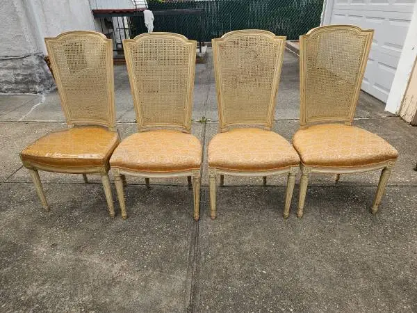 4 vintage cane back chairs