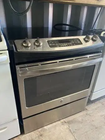 SS GE Slide In Electric Convection Stove Model #JS750SF2SS Used