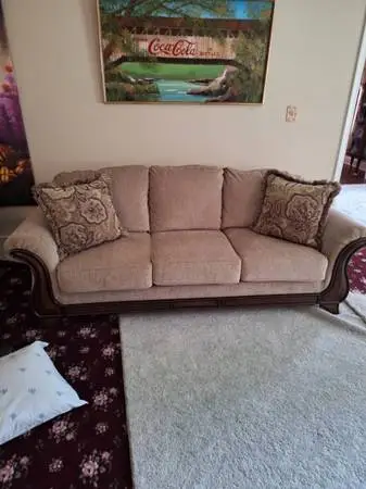 Sofas, (2), tan fabric with wood inserts.  1 new, never used, 1 used