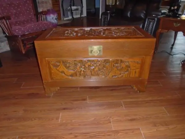 CEDAR CHEST WITH ORIENTAL CARVING ON ALL SIDES