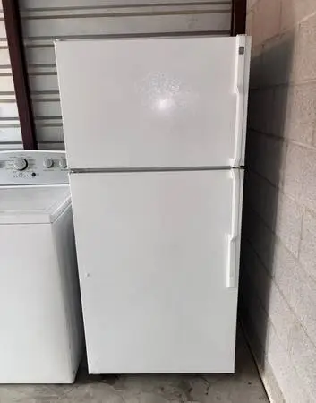 White GE Refrigerator And Freezer