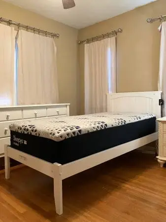 TWIN BED WITH FIRM MATTRESS, PRACTICALLY NEW