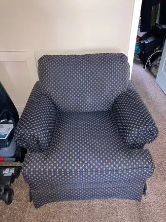 Beautiful Blue Cushioned Chair.