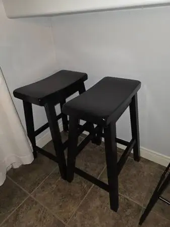 2 black bar stools