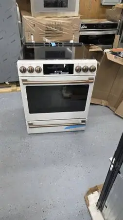Brand new GE Cafe slide in electric range with air fryer self-cleaning convectio