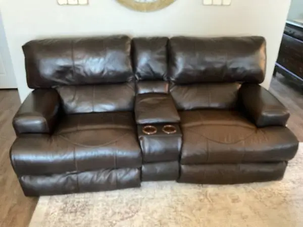 Brown Leather loveseat, power reclining & headrest, USB port
