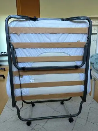 Folding bed , dining table, floor lamp