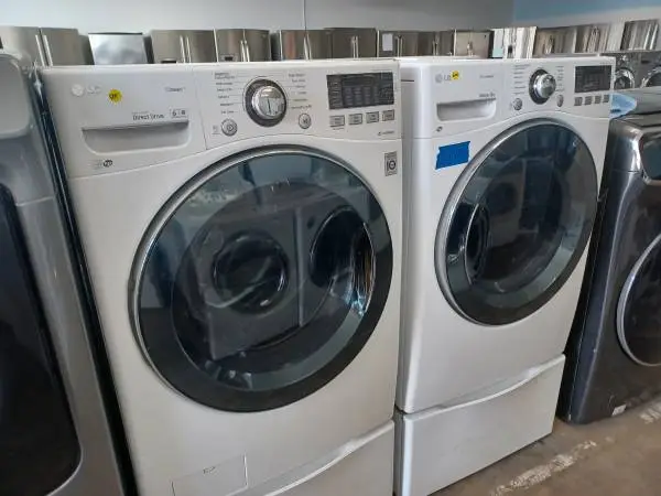 LG White Front Load Washer/Gas Dryer Set On Pedestals