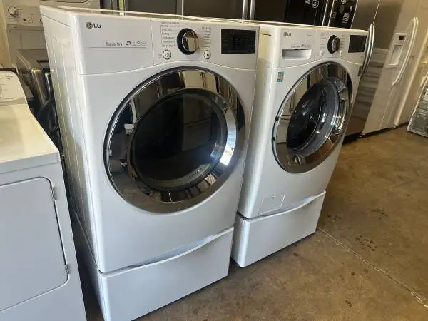 LG FRONT-LOADERS ON PEDESTALS WITH ELECTRIC DRYER RETAIL PRICE $2200 -