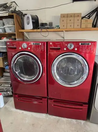LG Washer And Electric Dryer With Pedestals