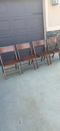 4 world market wooden folding chairs