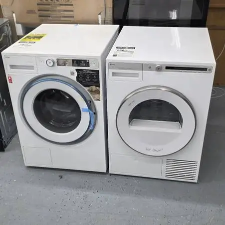 Brand new asko 24 washer dryer set