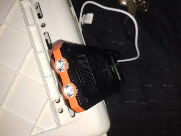 POWER SUPPLY FOR CELL PHONE S ETC HAS FLASHLIGHT