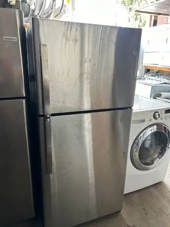 Warranty/free delivery 30” by 65” GE fridge great working condition