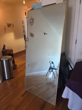 Giant standing mirror