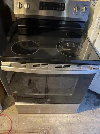 GE electric stove and side by side refrigerator delivery available