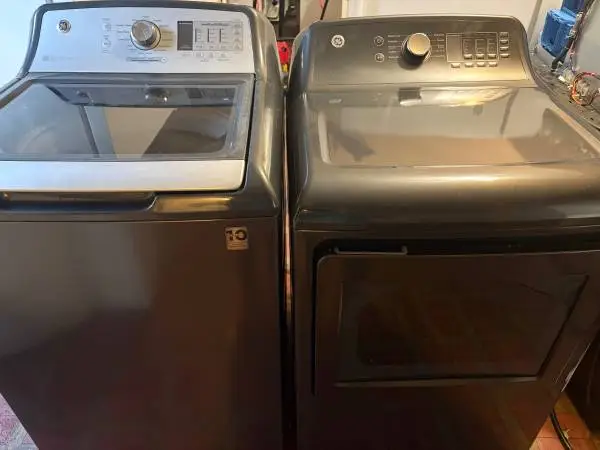 Like new ge large capacity washer and new matching electric dryer