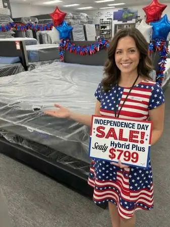 King Sealy Hybrid with black bed