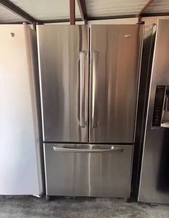 Amana Stainless Steel Refrigerator And Freezer