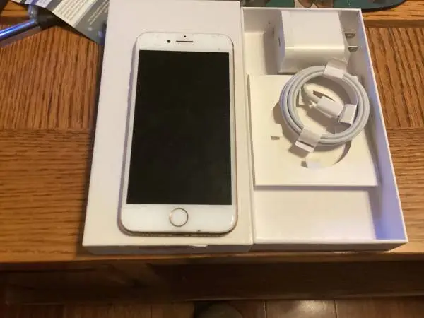 Apple iPhone with charger clean and ready to use