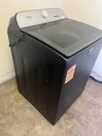 Volcano black Maytag New top load washer.