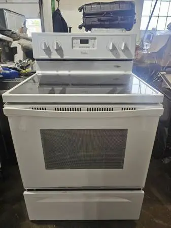 Whirpool electric stove . Delivery available