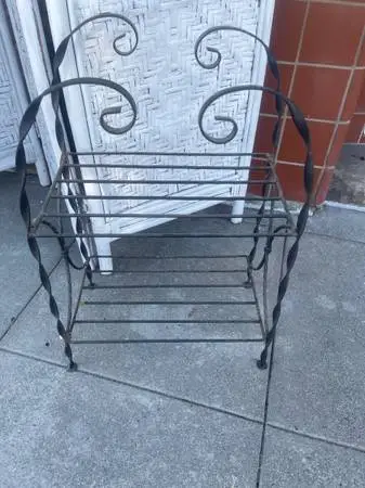 Vintage black iron plant stand shelf