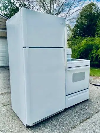 WHITE REFRIGERATOR AND ELECTRIC STOVE