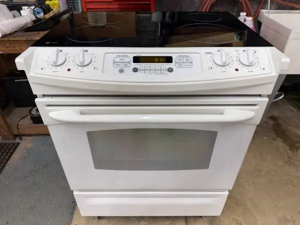 Glass top slide in stove