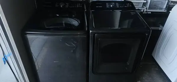 Black stainless samsung active water jet washer dryer set