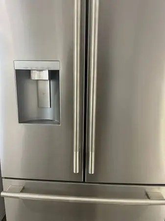 BOUGHT FOR AN OFFICE. USED FOR 6 MONTHS. FRENCH DOOR FRIDGE