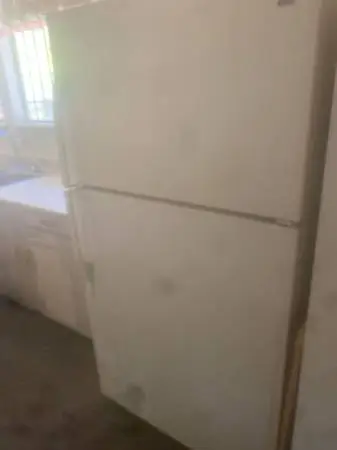 Kenmore full-size refrigerator and freezer two years old moving.