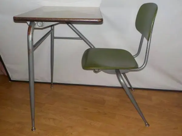 2 school desks with attached chairs