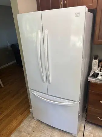 33 inch wide Kenmore refrigerator will deliver and install