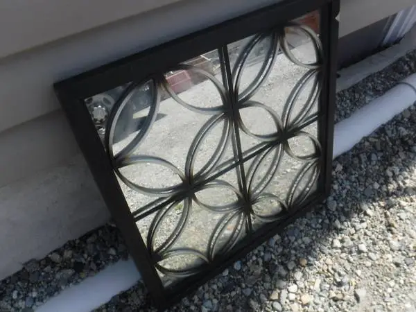 Sculptured Metal Framed Mirror