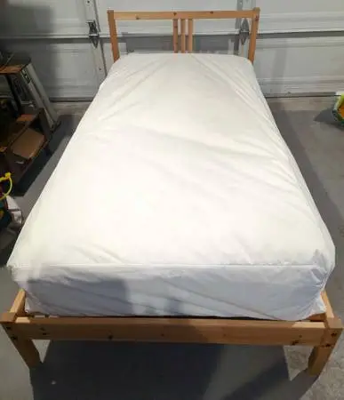 Twin bed frame with comfortable mattress